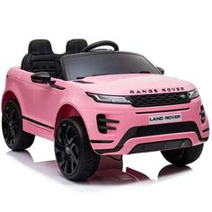 pink range rover ride on toy car with black wheels and seat covers for toddlers