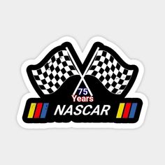 a sticker with two checkered flags and the words pit crew on it's side