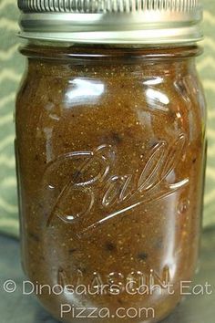 a jar filled with food sitting on top of a table