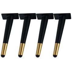 three black and gold pen holders are lined up in a row on a white background