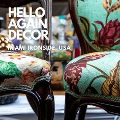 two chairs with floral fabric on them and the words hello again in front of them