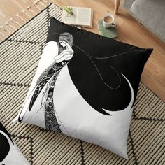 a black and white drawing of a woman with long hair floor pillow