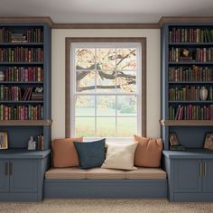 a window seat with bookshelves in front of it and a book case behind it