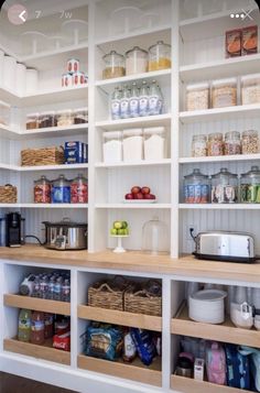 an organized pantry with lots of items on the shelves and words that read, our pantry was designed off of this