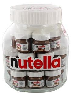 nutella jars are stacked in a glass container