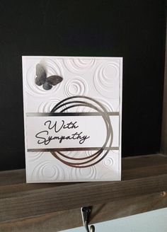 This listing is for a white and silver embossed sympathy card. It features a shiny silver swirl with a silver butterfly and the words WITH SYMPATHY in script.  Inside has a gray border with plenty of room to write your own message.  The card measures approximately 5.5 X 4.25" to fit in a standard A2 envelope. Will come packed in a clear cellophane sleeve.  These cards are created in a smoke free environment. Please ask any questions before buying. Each card is individually made so slight variations may occur. Sympathy Cards Stampin Up Ideas, Cards Sympathy, Sympathy Greetings, With Sympathy, Crafters Companion Cards, Sympathy Quotes, Awesome Tattoos, Embossed Cards