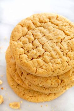 two peanut butter cookies sitting on top of each other