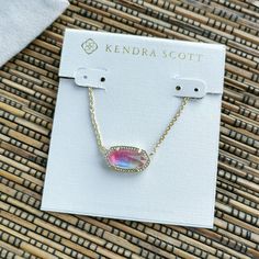 Kendra Scott Elisa Watercolor Illusion Pendant Necklace In Gold Authentic New With Dust Bag 0.63" L X 0.38" W Pendant, 15" Chain + 2" Extender Preppy Kendra Scott Necklaces, Kendra Scott Star Necklace Pink, Simple Necklace Everyday Kendra Scott, Kendra Scott Gold Pendant Necklace, Kendra Scott Clove Necklace, Pendant Necklace Kendra Scott, Kendra Scott Necklace Drusy, Pink Elisa Necklace, Kendra Scott Merrick Chain