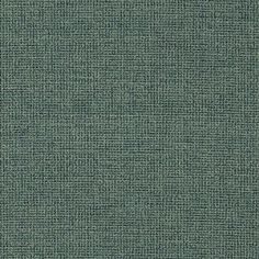 an upholstered green fabric textured with small squares