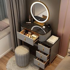 a vanity with drawers and a round mirror