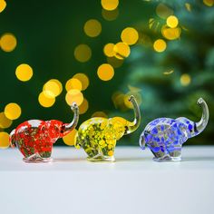 PRICES MAY VARY. Mini Elephants Collection: The glass elephants figurine is the collection of jungle animal decor for home or party decoration which are designed in 3 color as follow : yellow,red,dark blue Elephant Figurines Dimension: Elephant Measures : W 1.9-2.3 inches. X H 1.8-2 inches. Since it is handmade work so it may has a little different dimension from picture Handmade Craft: These elephant animal glass art figurines are hand blown work. Each of the hand-made glass statues is unique, Jungle Animals Decorations, Art Figurines, Home Christmas Decor, Elephant Lover, Blue Elephant, Elephant Figurines, Jungle Animal, Glass Animals, Holiday Greeting