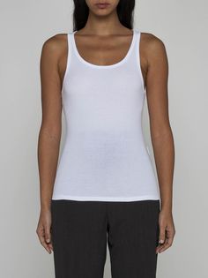 Filippa K's white ribbed knit stretch cotton tank top featuring a round neckline, racer-style and fitted silhouette. Composition: 95% cotton 5% elastane Fitted Knit Tank Top For Everyday, Fitted Tank Top For Everyday, Fitted White Camisole For Everyday Wear, Basic Seamless Fitted Tank Top, Everyday Fitted Ribbed Tank Top, Everyday White Stretch Camisole, White Fitted Camisole For Everyday, Classic Stretch Tank Top For Everyday, Fitted White Tank Top For Everyday