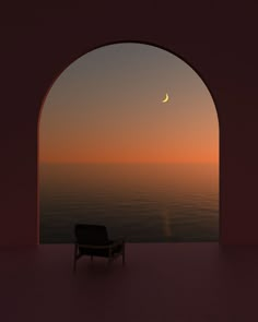 a chair sitting in front of an arch with the sun setting over the ocean behind it