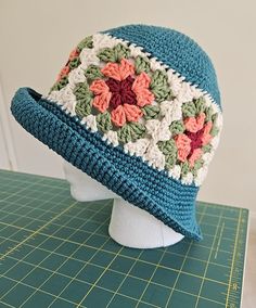 A crochet granny square bucket hat.