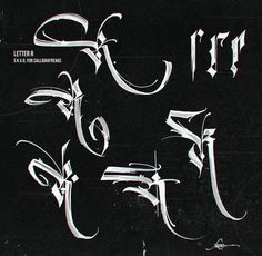 some type of calligraphy written in white ink on black paper with writing underneath it