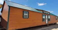 the tiny house is made from wood and metal