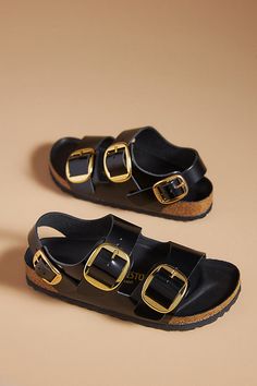 You’re a shoe -in for incredible style and comfort when you slip on Birkenstock®. (P.S. it’s our favorite step when putting together an OOTD)! | Milano Big Buckle High Shine Sandals by Birkenstock in Black, Women's, Size: 41, Leather/Metal/Tin at Anthropologie Sandles Spring 2024, Birkenstock Sandals Women, Comfort Shoes Women, Chic Sandals, Trending Sandals, Womens Summer Shoes, Birkenstock Sandals, Birkenstock Milano, Buckle Sandals