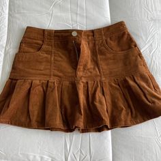 Super Cute Mini Skirt!!! Brown Corduroy With Pocket Details And Drop Waist!! Pleated Bottom!!! (Pictured Wearing Size Xs)! This One Is Size S Unworn! Corduroy Mini Skirt Pattern, Corduroy Skirt Outfit, Cute Mini Skirt, Corduroy Mini Skirt, Corduroy Skirt, Brown Corduroy, Skirt Outfit, Drop Waist, Pocket Detail