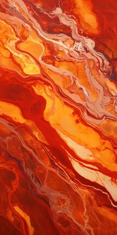 an abstract painting with orange, red and yellow colors on it's surface that looks like marble