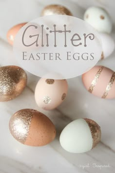 glitter easter eggs on a marble surface with the words glitter easter eggs overlayed