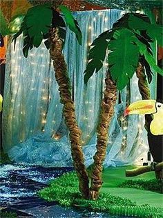 there is a tropical scene with toucans, palm trees and waterfall in the background