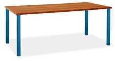 a wooden table sitting on top of a white floor next to a blue metal frame