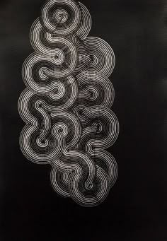 a black and white drawing with swirls on it