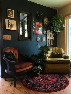 a living room filled with lots of furniture next to a large window covered in pictures