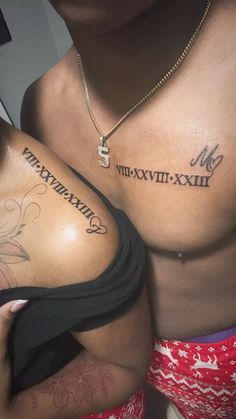 two people with tattoos on their chests