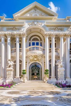 a large white building with columns and arches