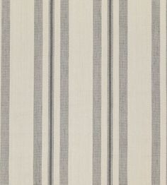 a white and blue striped wallpaper with vertical stripes