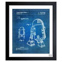 a blueprint drawing of a space shuttler on a table next to a bowl