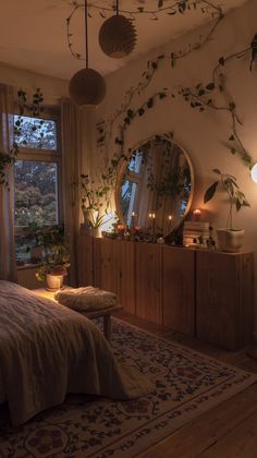 the bedroom is decorated with plants and lights