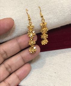 Christmas Gift, Holiday Gift,  Hanging Earrings, 24 k gold filled dangle drop earrings, Drop Earrings Get this beautiful piece for that final touch to your beauty look. Trendy design suitable for all occasions, wedding, party wear, Anniversary, birthdays. Lovely long Tassel Earrings are handcrafted in 24k gold filled. Material: 21k gold plated Size 2.94inches approx Lead and Nickle free Hypoallergenic Dangling Earrings Gold, Arabic Henna Designs, Wedding Party Wear, Long Gold Earrings, Long Tassel Earrings, Party Kleidung, Ear Rings, Hanging Earrings, Final Touch