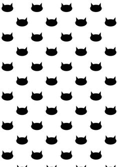 a black and white pattern with cats'heads