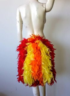 "We make and ship our items really fast if you need it for a specific date please let us know. or call/text us at 954-3051817 to complete your order over the phone Fire Multi Colors Economical Feather Tail Fan tail back cover Feather Bustle Boa tutu feather belt COSTUME SHOWGIRL BURLESQUE Approx Tail size is: Length 18\" x 14\" wide 2 ways to attach it : Pin it to your outfit or tie it with the 1\" wide 60\" long matching color Satin Ribbon( removable) If you want a different color combination p Feather Bustle, Feather Belt, Veil Diy, Samba Costume, Feather Angel Wings, Carnival Halloween, Pride Colors, Feather Headdress, Colorful Feathers