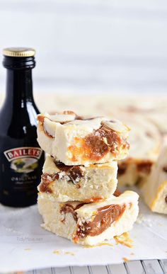 three pieces of cake next to a bottle of beer