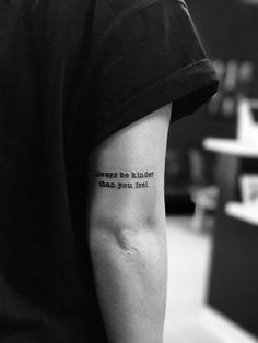 a person with a tattoo on their arm that says, always be kinder than you are