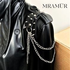 Leather epaulettes with chains and spikes. Accessory in the style of rock metal, which is attached to a coat or jacket. It is fastened by threading a belt from the jacket.  The price includes 2 pieces. Spiked Shoulder Pads, Metal Shoulder Pads, Spiked Collar Aesthetic, Leather Epaulettes, Leather Pauldron, Shoulder Jewellery, Shoulder Chain Jewelry, Shoulder Accessories, Chain Outfit