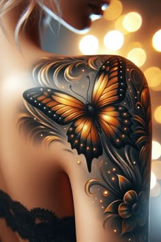 a woman's back with an orange butterfly tattoo on her upper arm and shoulder