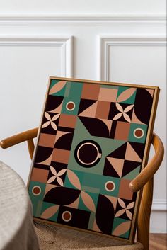 a wooden chair with an artisticly designed seat cushion on it's backrest