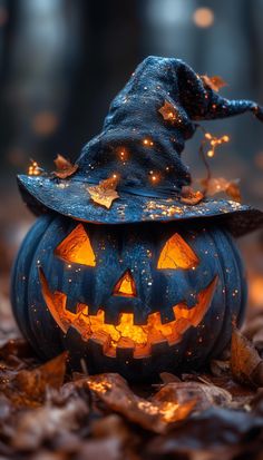 a halloween pumpkin with a witches hat on it