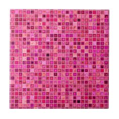 a pink tiled wall with squares on it