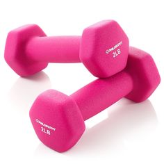 two pink dumbbells sitting on top of each other