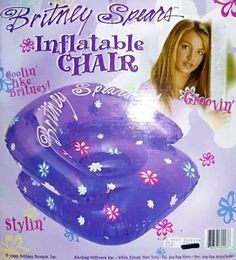 the inflatable chair is purple with flowers and stars on it's sides