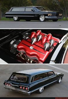 an old black car with red engine covers and chrome rims