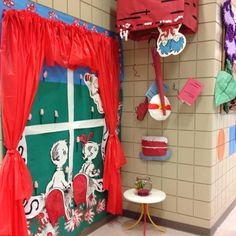 a room decorated with dr seuss and cat in the hat decorations