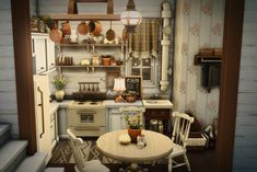 a small kitchen is shown with pots and pans on the shelves above the table