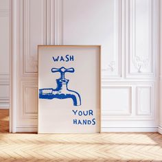 a blue and white sign that says wash your hands on the wall next to a faucet