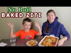 two children sitting at a table with pizza in front of them and the words no boil baked zitti